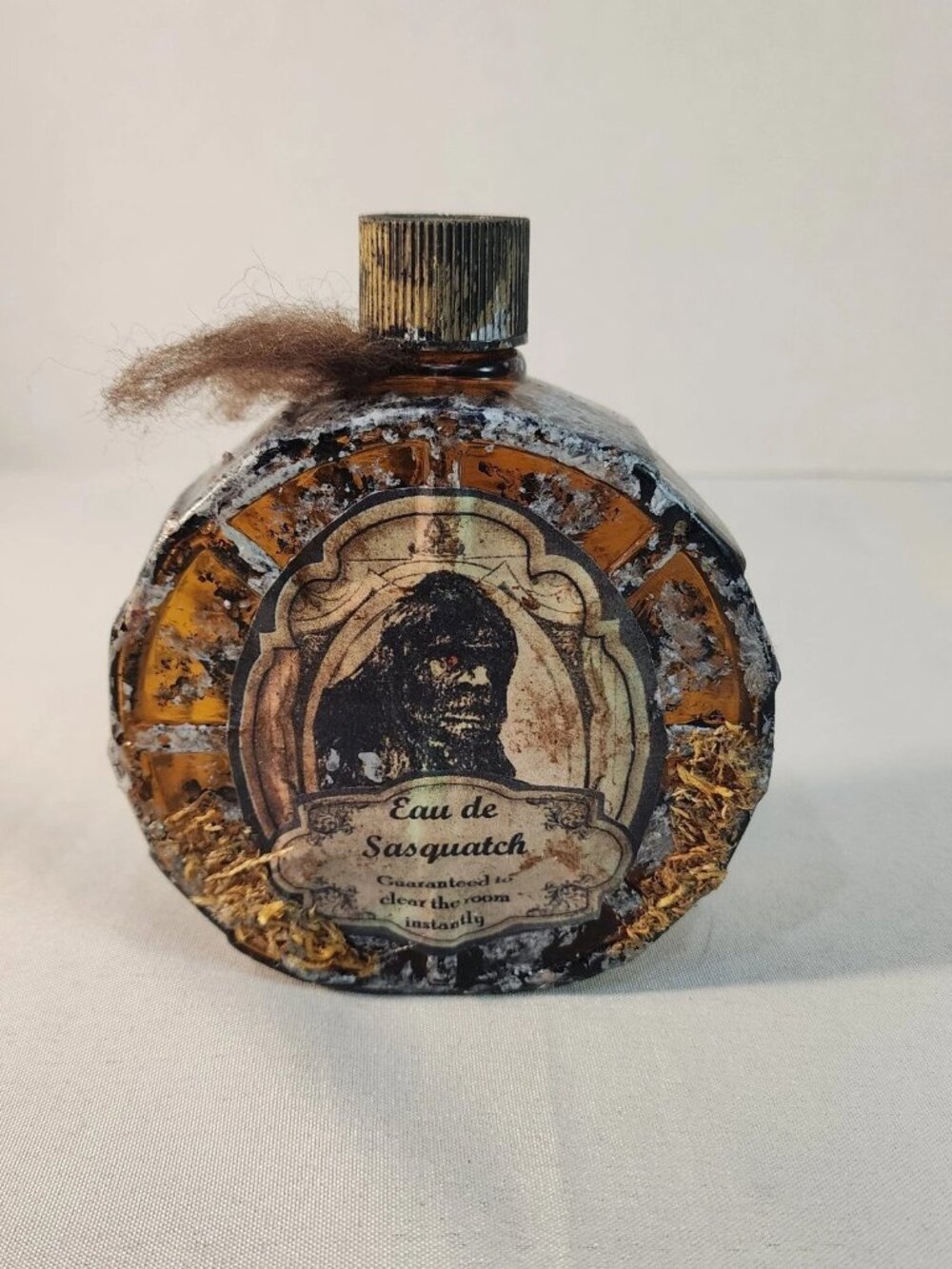 Decorative Novelty Bottle Labeled "Eau de Sasquatch"